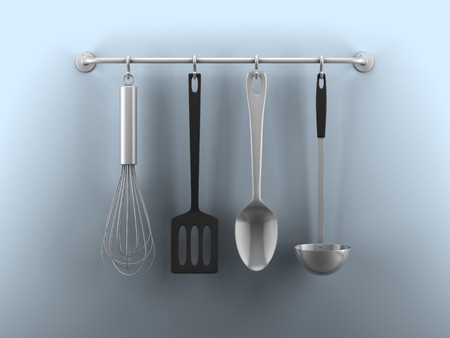 A render of hanging kitchen utensils on a blue wallの写真素材