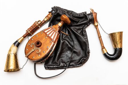 Bagpipes, a traditional musical instrument. Bagpipes are a woodwind musical instrument from the group of reed aerophones (pipe aerophone). Close-up and white background.の写真素材