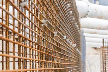 Rusty steel reinforcement rebar bars for concrete pouring. Industrial background of construction siteの写真素材