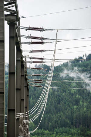 Busbar, autotransformer, supports, switchgear in the electric power station transformer,...