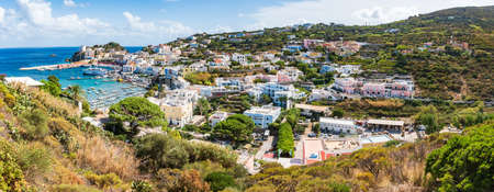 Panoramic view of the port of the Ponza island in summer. Colored houses, boats, ferry in the harbor of island of Ponza.のeditorial素材