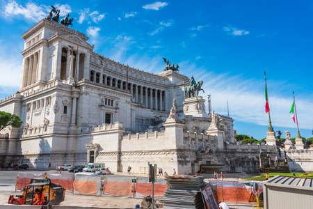 Rome, Italy - Construction site and construction work before the Altar of the fatherland, Piazza Venezia, the monument to Vittorio Emanuele II and Italian flags.のeditorial素材
