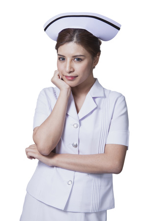 Young woman asian nurse attractive beauty brunette in white backgroundの写真素材