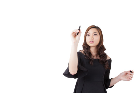 Business success growth chart. Businesswoman drawing graph showing profit growth on virtual screen. Asian businesswoman isolated on white background in suit.の写真素材