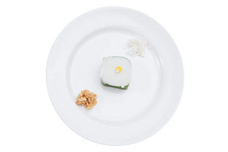 Thai Candy "TACO" preparation on white bowl with coconut and dried shredded pork,の写真素材