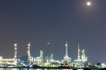 Oil refinery at night Located on the river night and the moon /Bangkok, Thailand.のeditorial素材