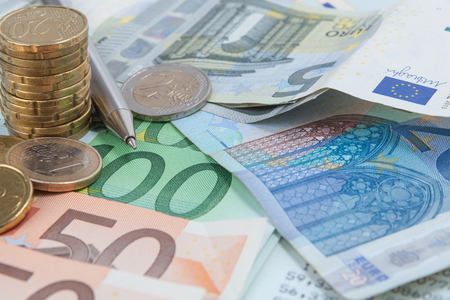 Finance background with money, cion and bill or banknotes.の写真素材