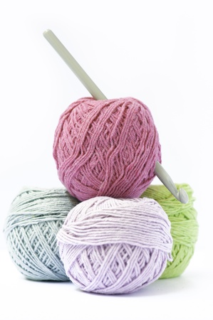 Four color cooton ball with a needle for kittingの写真素材