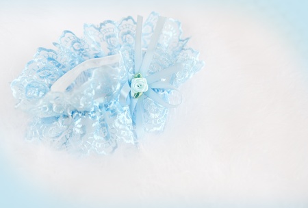 Wedding background with  blue bridal garter on the downの写真素材