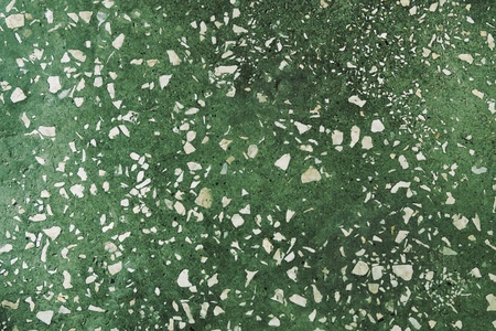 old cement grunge floor background with white stonesの写真素材