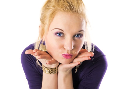 studio portrait of blonde woman with blue eyesの写真素材