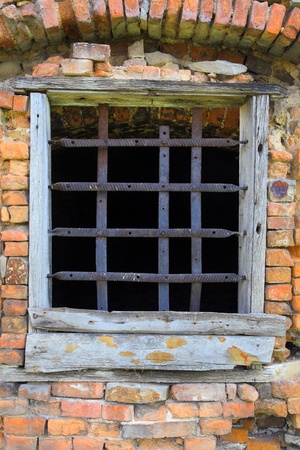 Old window with barsの写真素材