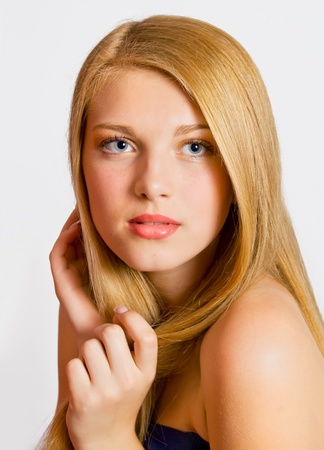 Close-up portrait of sexy caucasian young woman with beautiful healthy hairの写真素材