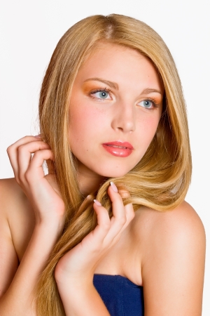 Portrait of a beautiful female model on white backgroundの写真素材