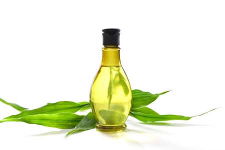 Spa treatment with bottle and green bambooの写真素材