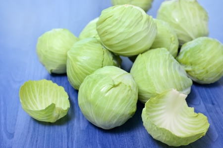 Group of Fresh Cabbages on wooden  blue backgroundの写真素材