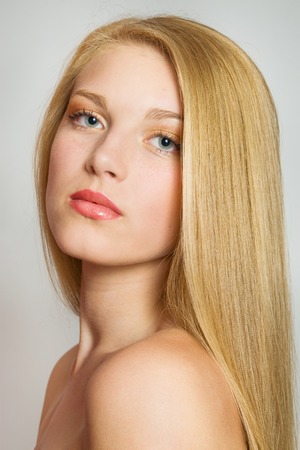 Blond Hair.Close-up portrait of beautiful Woman with Straight Long Hairの写真素材