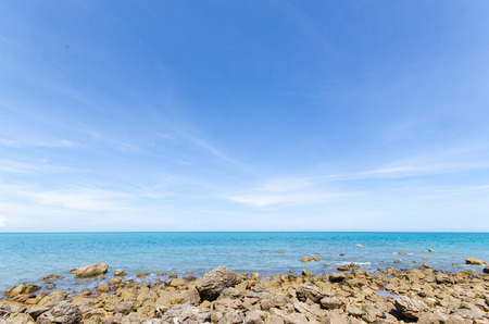 Sea with stone and blue skyの写真素材
