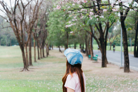 Women turn back in the parkの写真素材