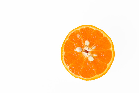 Half orange on white backgroundの写真素材