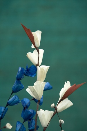 Bunch of decorative pearly white, sapphire blue and ruby red flowers