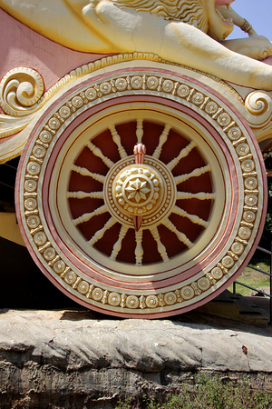 Close-up of beautifully sculptured wheel of Arjunas chariot at Viswashanti Ashram, near Bengaluru, Karnataka, India, Asiaの写真素材
