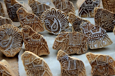 Etched artwork on slabs of stone displayed near Gadisar Lake in Jaisalmer, Rajasthan, India, Asiaの写真素材