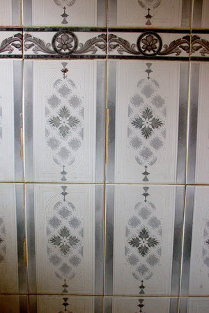Close-up view of vertical tiles fixed on bathroom wall of home