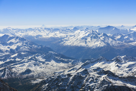 Panoramic view on the Swiss Alps from the top of Mont Blanc. Perfect moment in alpine highlands. Chamonix, France.の写真素材
