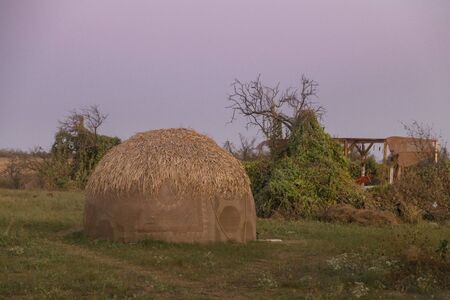 Summer camp in the southern steppe at sunset, Kinburn Foreland shore, Black Sea, Ukraineの写真素材