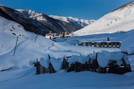 Svan towers durring sunset attached to residential houses in the province of Ushguli are the symbol of Svaneti, the Caucasus, Georgiaのeditorial素材
