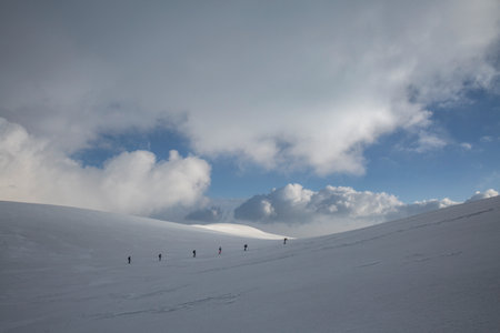 Teamwork Triumphs: A united effort carries the hikers forward, their determination fueled by the...