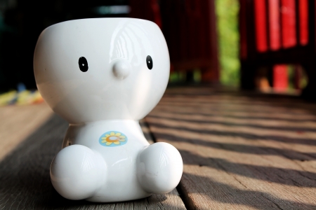 A white widemouthed glass jar in cartoon style  の写真素材