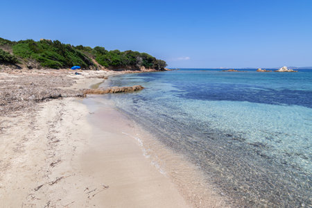 Panorama of a Summer Day in Vignola Beach in Sardiniaの写真素材