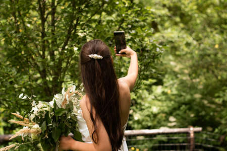 Beautiful bride making selfie before wedding. Wedding dayの写真素材