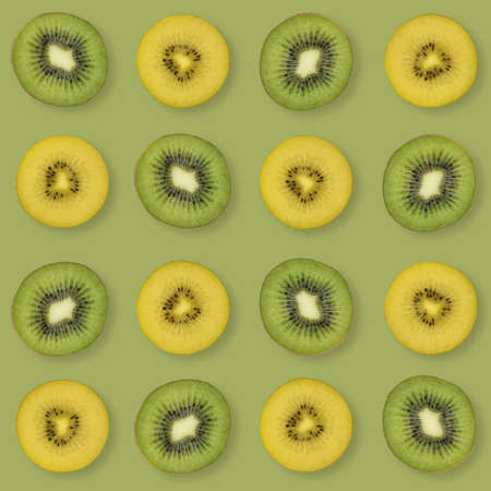 Pattern of kiwi slices. Food background. Yellow and green kiwi slices. Pattern of fresh fruits.の写真素材