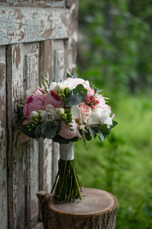 Pink wedding bouquet, composed of roses, freesias, peonies, hypericum, astilba and eucalypthus.の写真素材