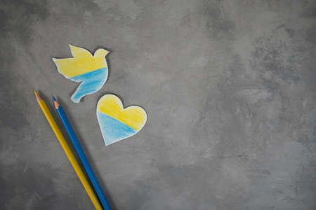 Ukraine flag. No war in Ukraine story size poster design. Ukraine flag from yellow flowers arranged into heart shape.の写真素材