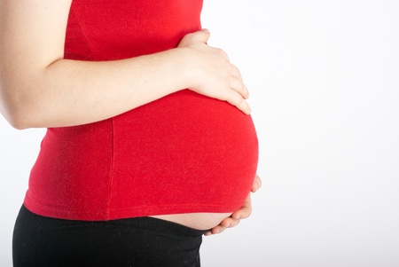 Stomach of the pregnant woman close upの写真素材