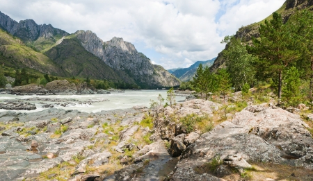Rocky shore of a mountain river の写真素材