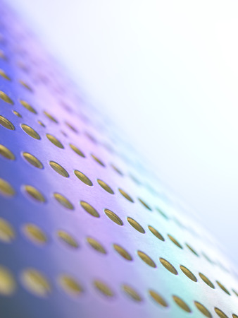 Metal plate with holes shaded with colors lightの写真素材