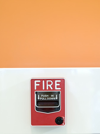 Fire alarm switch at wallの写真素材