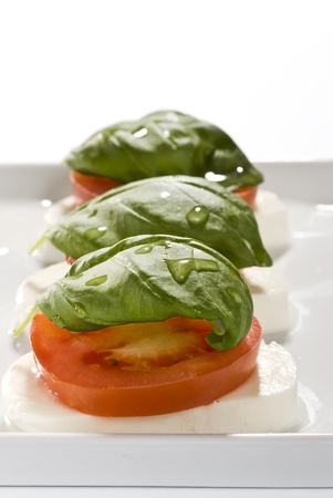 Tomato-mozzarella with basilの写真素材