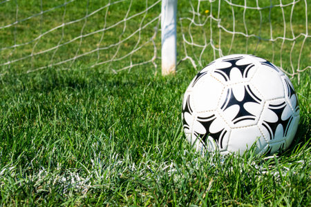 Soccer ball in netの写真素材