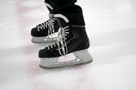 Hockey skates on iceの写真素材