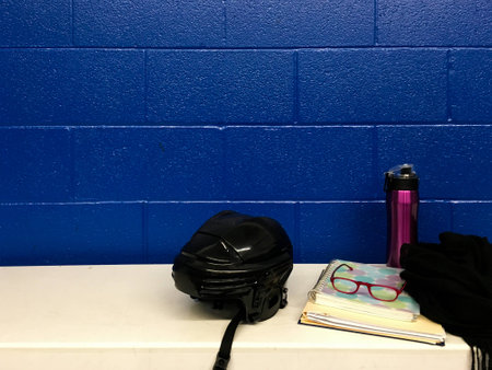 Hockey helmet, game after work in locker room with copy spaceの写真素材