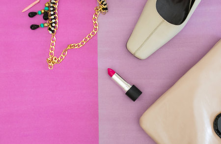 Top view of woman beauty accessories shoes, purse, lipstick. Night out. Text spaceの写真素材