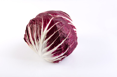 Red chicory, radicchio, on white backgroundの写真素材