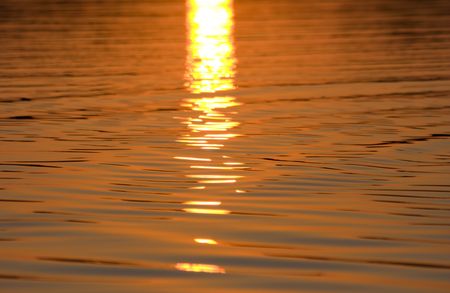 sun track from sunset on water