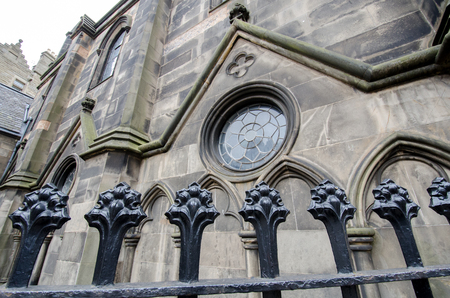 Elements of a fence surrounding old church in Edinburgh Scotlandの写真素材